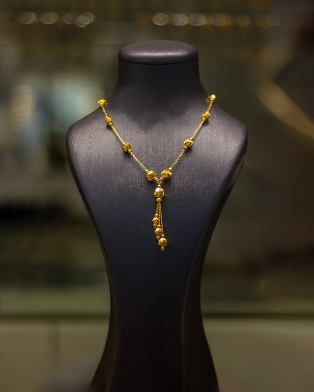 The Golden Bead Lariat Necklace